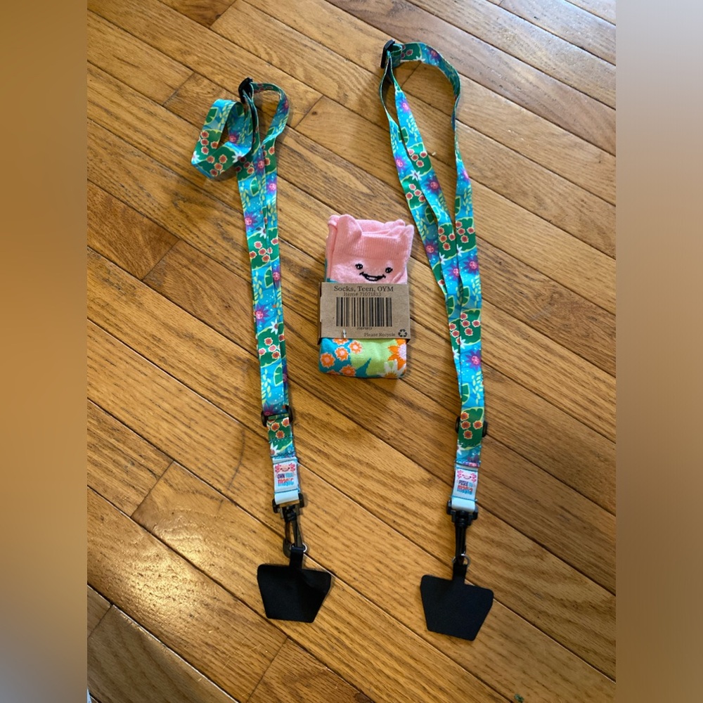 Girls Scouts a pair of socks and 2 lanyards. Own your magic. 2024 cookie reward.